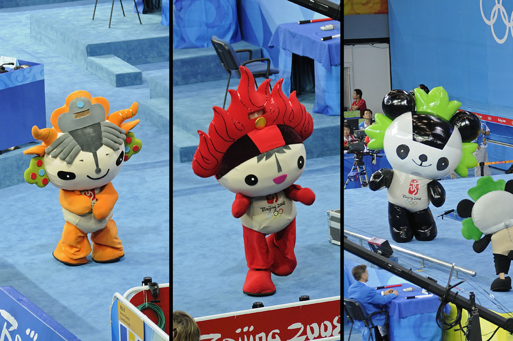 Mascots entertain spectators at weightlifting