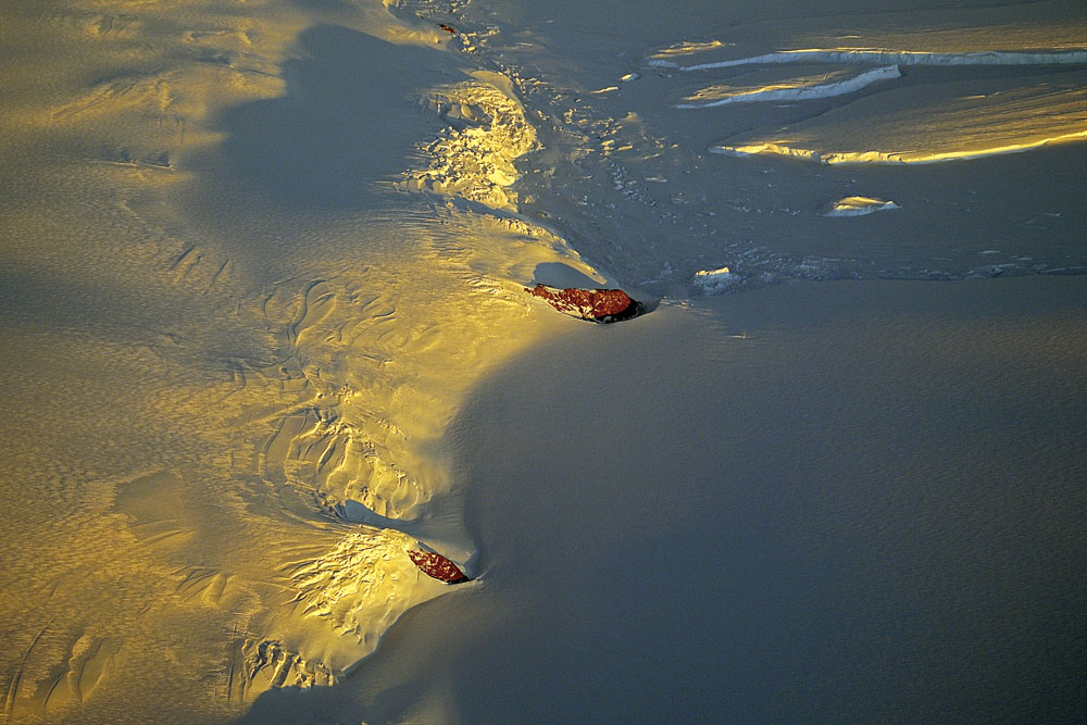 In the icecap, peaks of land occasionally protrude