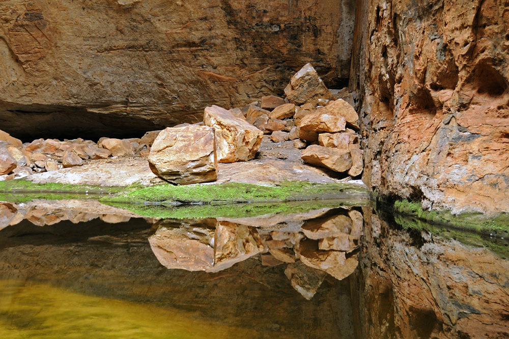 Pool of water in the box canyon of Cathedral Gorge