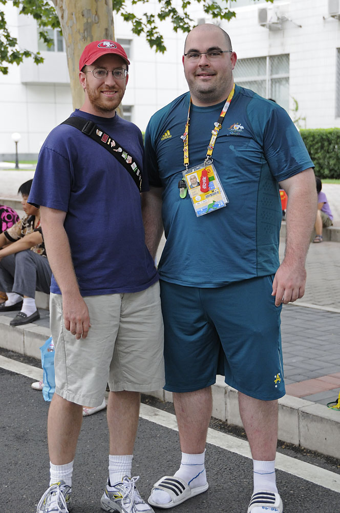 Adam with weightlifter outside venue
