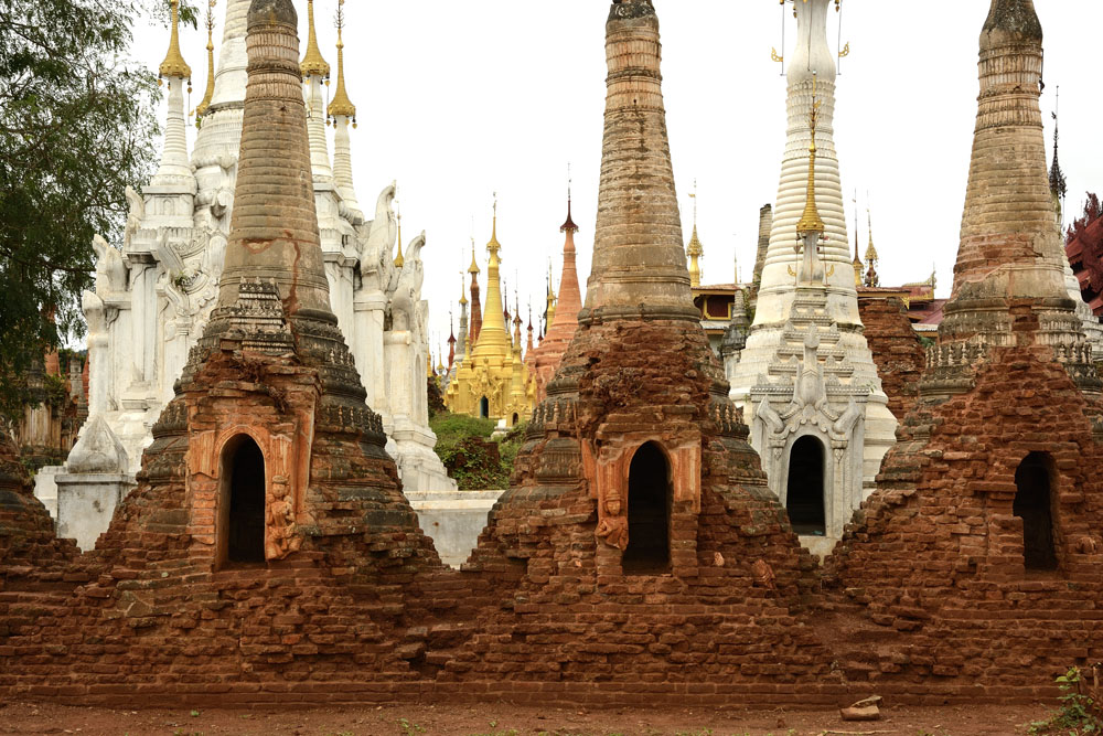 Religious site with hastily restored structures in background