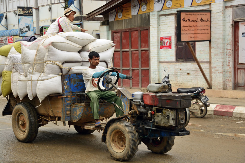 Signaling for a left turn on fully laden truck