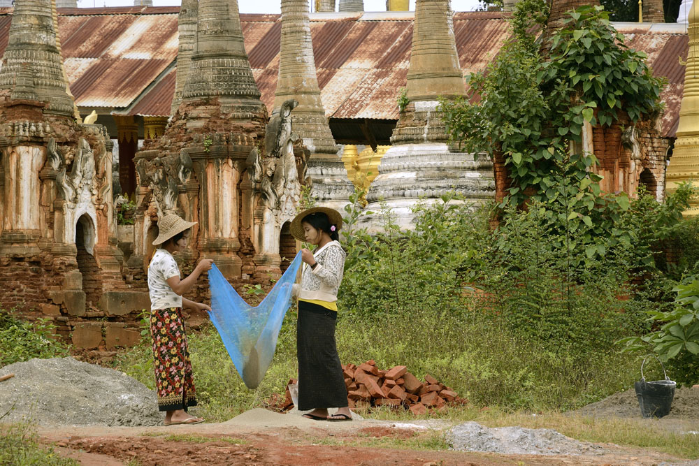 Sifting crushed rock to get powder for cement
