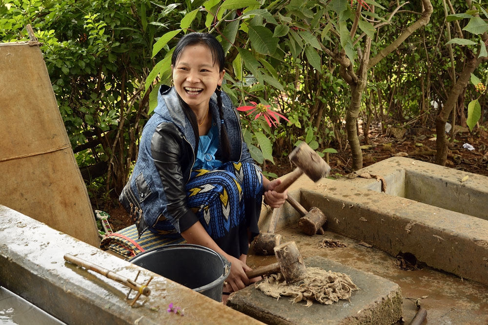 Pounding material to get fibers to make paper