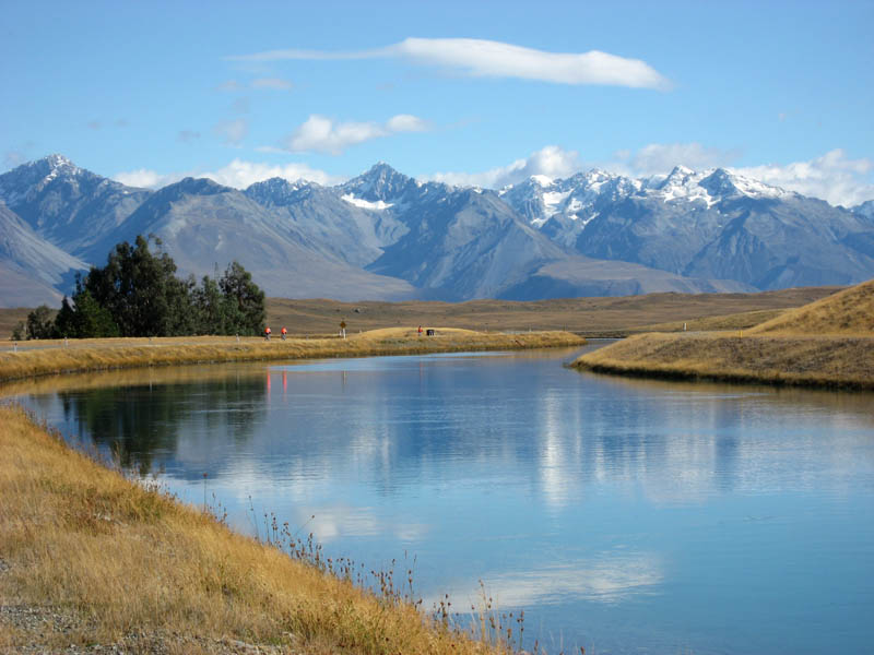 Bicycle Riders along the Canal
