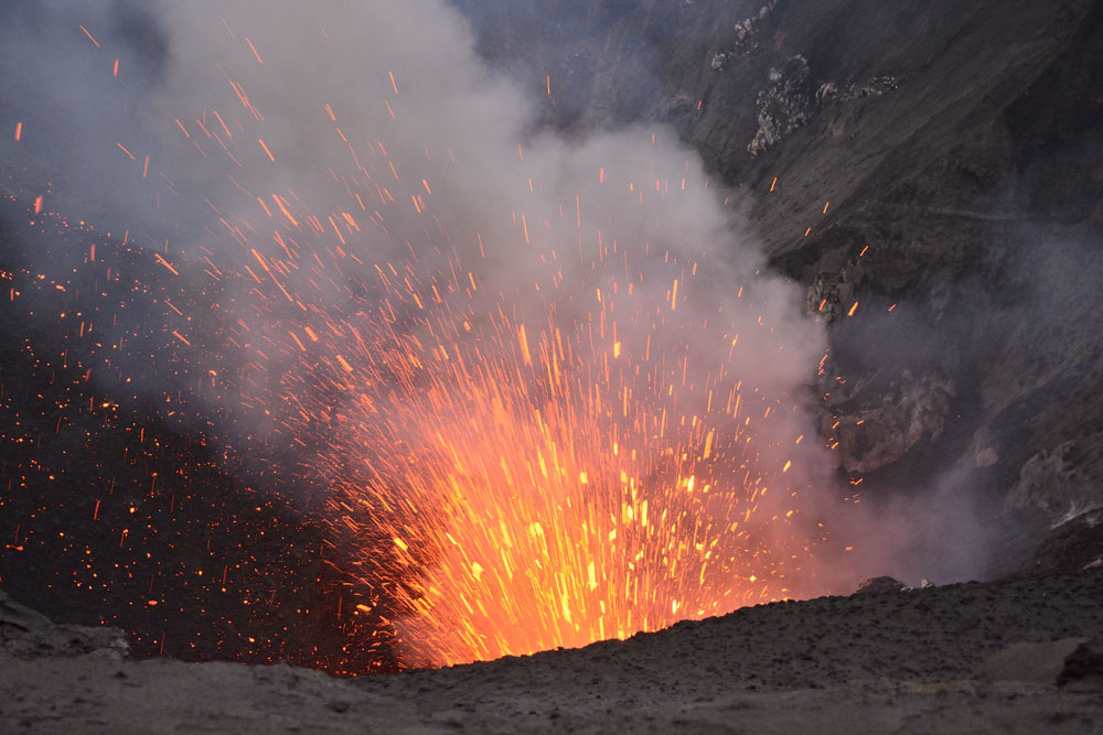 Eruption of molten rock (magna) in early evening before sunset